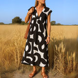 Laura | Vestido maxi con estampado artístico