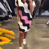 Karina | Vestido con estampado de olas y escote en V