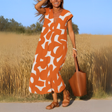 Laura | Vestido maxi con estampado artístico