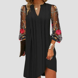 Renée | Elegante minivestido con mangas transparentes