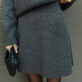 Conjunto de falda y jersey de punto